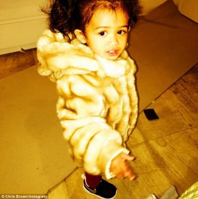 'Care Bear!' The 26-year-old Grammy winner's 18-month-old princess was bundled up in a £208 Childsplay Clothing 'Microbe' faux fur coat featuring a detachable hood